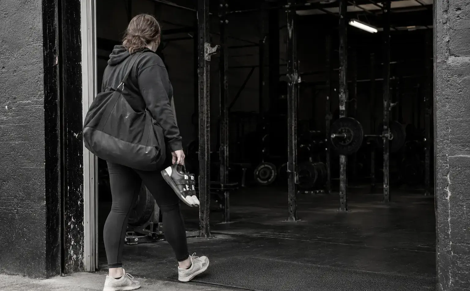 An anonymous beginner arriving at a no-frills strength gym